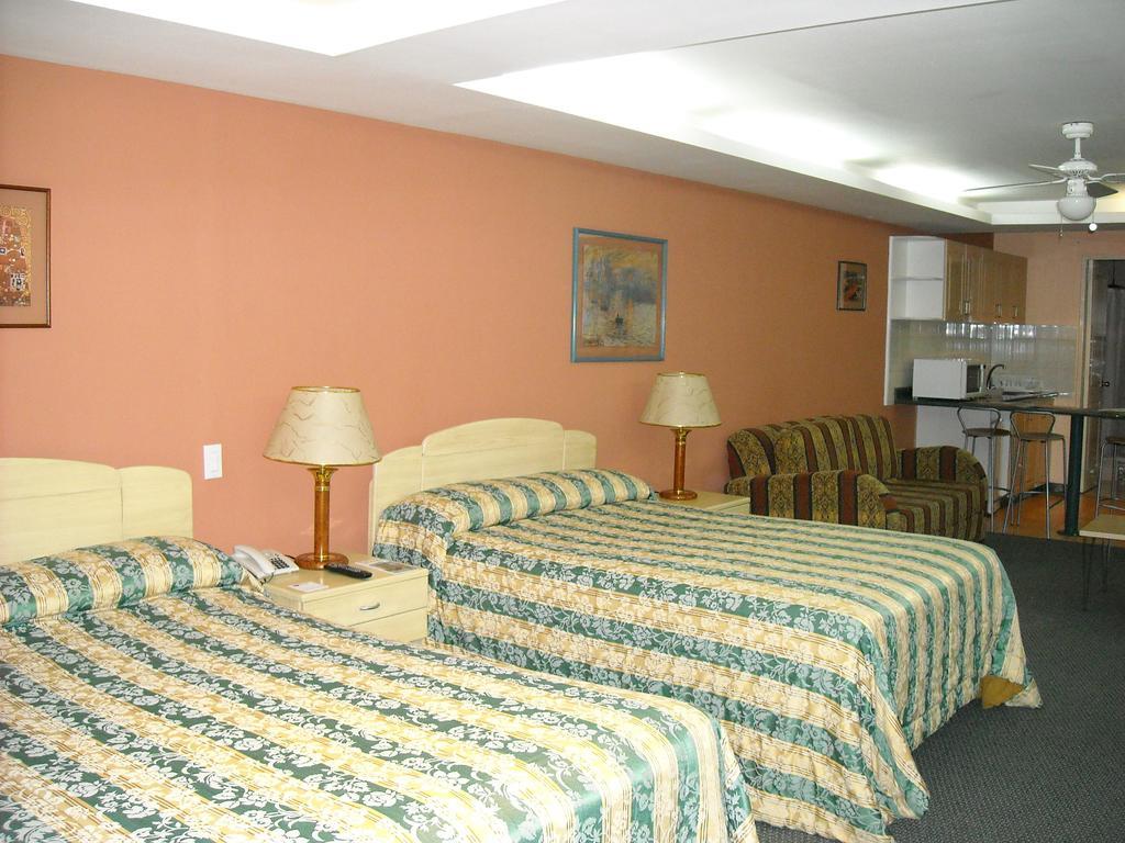 كويتو Melrose Plaza Suites الغرفة الصورة